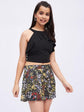 Black crop top with floral print skirt