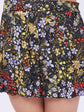 Black crop top with floral print skirt